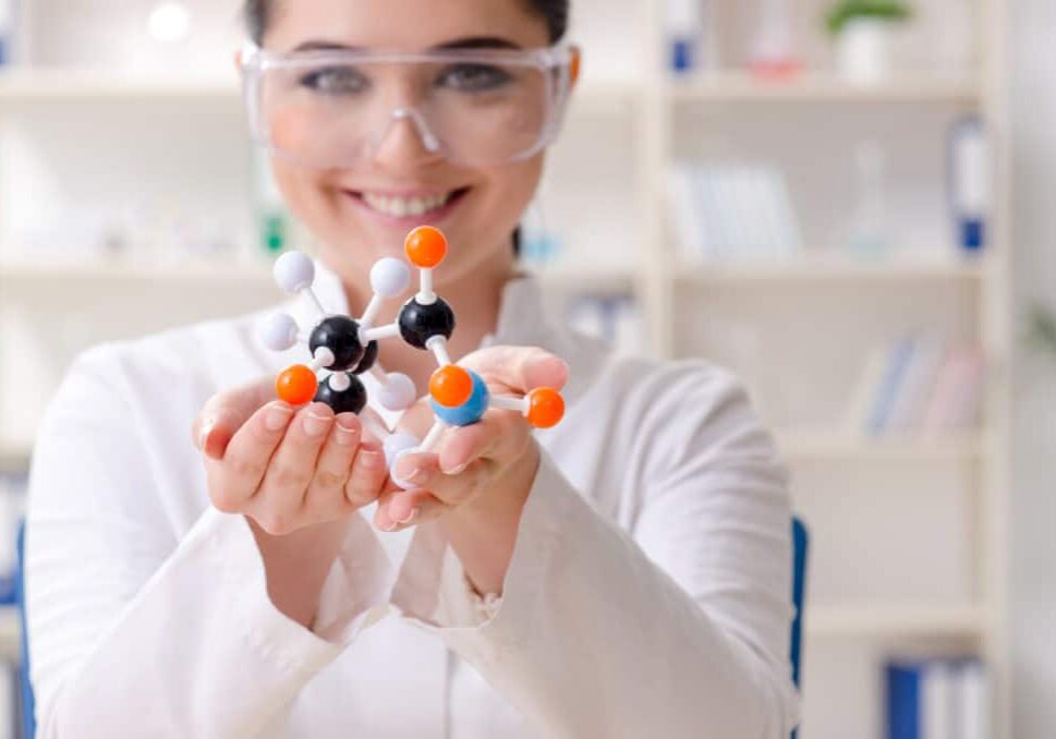 Young female chemist working in the lab Young female chemist working in the lab