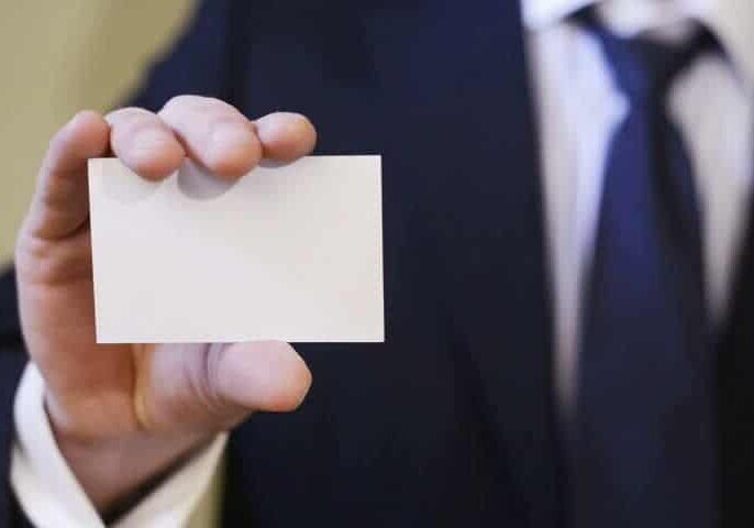 Business-Card man holding out business card